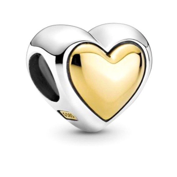 in 925 sterling silver, this heart shaped piece includes a 14k gold heart. - Picture 1 of 2